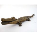 A c.1900 large cast brass nut cracker in the form of a crocodile 14 1/2" long  CONDITION: Please