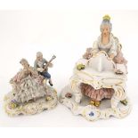 Dresden figurines depicting figures with glazed netting detail comprising a female seated at a