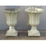 Garden and Architectural : a pair of re-constituted stone pedestal urns with fluted decoration