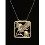 A Georg Jensen silver pendant of squared form with birds ( robins)  and wheat sheaf decoration.