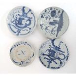 A collection of 4 blue and white Chinese plates comprising 2 plates depicting 5-toed dragons, one