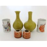 A collection of Chinese ceramics, to include a pair of famille-rose cylindrical brush pots depicting