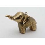 A 9ct gold pendant charm formed as an elephant approx 1" long (2g) CONDITION: Please Note -  we do