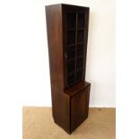 William Baker & Co. Oxford : An early 20thC oak astral glazed bookcase on cupboard . Bears ivorine