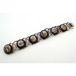 Grand Tour Jewellery : A Continental silver / silver gilt bracelet set with 6 micro mosaic ovals