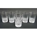 A Set of 5 + 1  glass tumblers with slice cut decoration and star cut base ( 5 x 4 1/4" high)