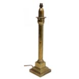 Palmers patent : A Palmer & Co brass column formed table lamp with squared base and lotus flower