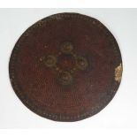 Militaria : A rare Mutiny - period Indian hide Targe shield , decorated with red lacquer and