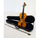 Musical Instruments : A cased mid 20thC steel strung violin & bow , light maple construction with