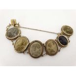 Grand Tour Jewellery : A gilt metal bracelet set with 6 lava relief cameos depicting classical