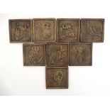 A set of 8 post war British / African cast bronze plaques depicting Rhinoceros , Elephant ,