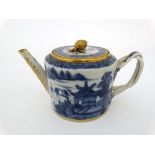 A 19thC Chinese Export blue and white teapot and cover having double twist handles, straight spout