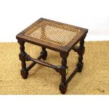 An early 20thC Commonwealth style caned top stool  approx 15 1/4" x 15" x 15" high 
 CONDITION: