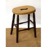 An early 20thC leather covered 4-legged oval stool 21 1/2" high  CONDITION: Please Note -  we do not