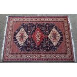 Rug carpet : A machine-made rug in the style of a Persian rug. 92 x 62”. CONDITION: Please Note -