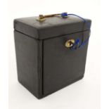 A 19thC leather covered jewellery casket with hinged top and front. 6 1/4" high x 5 7/8" wide x 3