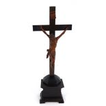 An early 19thC carved box wood Corpus Christi. The finely carved Christ figure mounted on cross with
