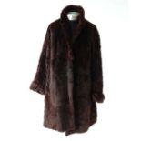 Vintage Retro : a dark brown fur coat with similar coloured lining, with two outside pockets