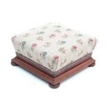 A Victorian squared overstuffed stool with walnut moulding and squat bun feet 14 1/2" sq.