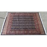 Rug carpet : A machine-made rug in the style of a Persian rug. 90.5 x 63. CONDITION: Please