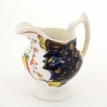 A 19thC Gaudy Welsh shaped jug decorated in Tulip pattern. Height 3” CONDITION: Please Note -  we do