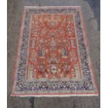 Carpet rug : a shallow pile rug with Islamic minuets etc, a four banded border in salmon, navy