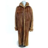 A C. 1945 ladies long vintage mink coat, with brown lining and  large turn back cuffs
 CONDITION: