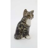 A handmade Winstanley cat size 2 . Model W203. Marked to base. 7'' high.  CONDITION: Please