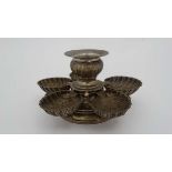 A continental white metal early 20thC unusual pedestal  ashtray having 5 scallop shaped removable