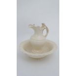 A Leedsware Classical Creamware ewer and basin. The Ewer of balluster shape on a pedastal foot. With