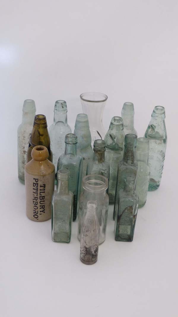 Bottles : a quantity of assorted excavated bottles to include 3 aqua COD Bootles, amber COD bottle
