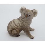 A Beswick koala bear number 1038. Impressed mark to base. 3 1/4'' high. CONDITION: Please Note -  we