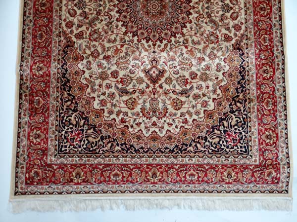 Carpet / rug :  a Keshan carpet with beige ground , black, red, and dark mustard colours , 95"x 62" - Image 3 of 3