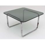 Vintage Retro : A bent chromed tubular smoked glass topped table of squared form , the top 25 1/4"