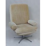 Vintage Retro : A Danish upholstered swivel armchair , with 5 spoke chromed base and arm rests.