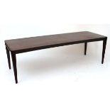 Vintage Retro : A Danish Rosewood ? Long Coffee table standing on four turned tapering legs , with