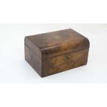 A 19thC quarter domed work box the lid opening to reveal; a lift out burgandy satin fitted tray