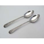A pair of Victorian silver tea spoons with wrigglework handles, Exeter 1880 maker Josiah