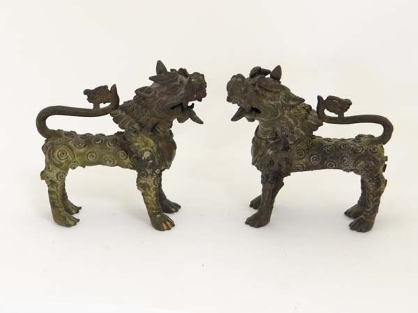 A pair of bronze Vyala, Nepal , 19th / 20th century, Their fanged mouths open, the bodies with swirl - Image 2 of 12