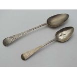 A Geo IV silver tablespoon with bright cut decoration. Hallmarked  London 1825 maker William Bateman