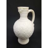 A Minton Parian ware Jug with mask spout with moulded quatrefoil scallop decoration to body. Late