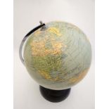 Globe on stand : an 8 inch globe by Geographia of London named “The Planet” with chromed North -