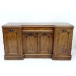 S J Waring & Sons Liverpool :  An early Victorian mahogany inverted break front sideboard with