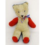 A 1953 Chad Valley Queen Elizabeth II Coronation Teddy Bear. With red, white and blue artificial