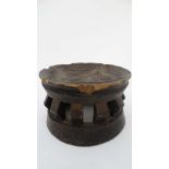 Native Tribal : an African stool of carved circular form with many legs as support. 7 1/4  " in