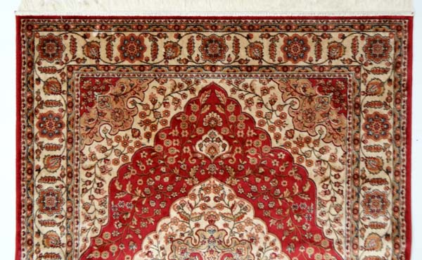 Carpet / rug : a Kum carpet with red ground , central biege medallion having foliate decoration, - Image 2 of 3