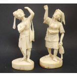 A pair of c.1900 Indo figures ( man and woman with child )  stood upon a shaped base. Each
