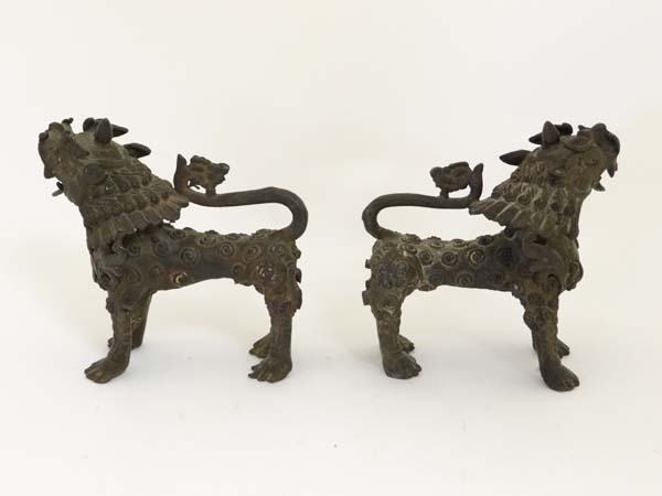 A pair of bronze Vyala, Nepal , 19th / 20th century, Their fanged mouths open, the bodies with swirl - Image 3 of 12