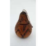 Native Tribal : an African lidded Gourd container, the lidded held captive by a string, 6 1/2  "