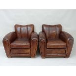 A superb pair of Art Deco style Rockson's leather club chairs, standing on short square tapering